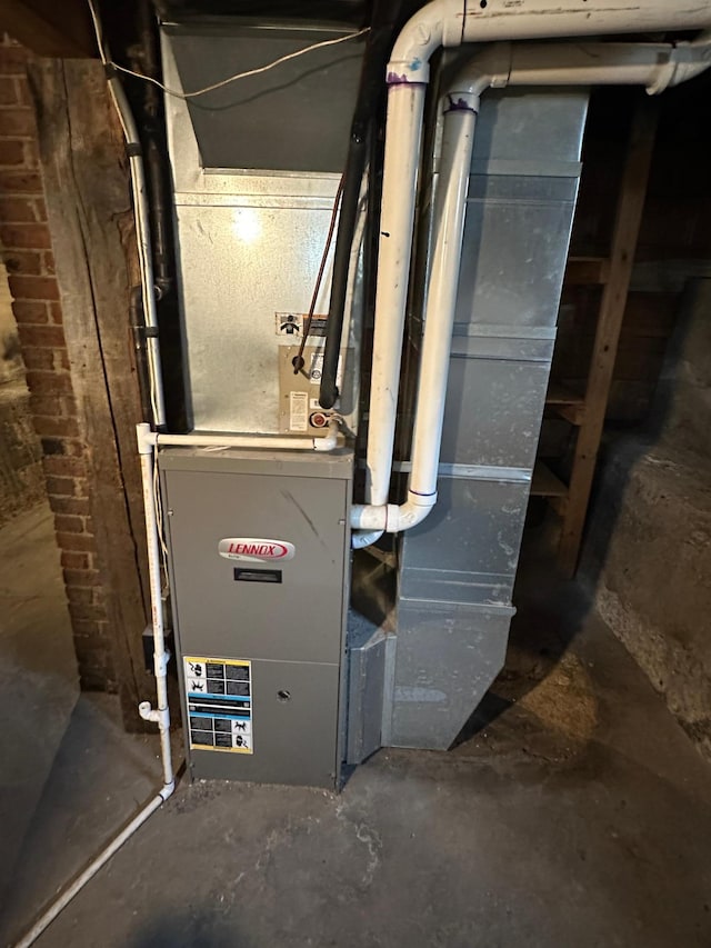 613 Cedar St, Luverne, MN 56156 - utility room featuring heating unit