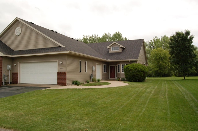 224 Goldfinch Ln, Clearwater, MN 55320 - view of front of property with asphalt driveway, a garage, a front lawn, a shingled roof, and brick siding