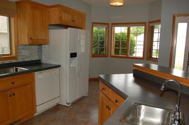 224 Goldfinch Ln, Clearwater, MN 55320 - kitchen featuring white appliances, backsplash, dark countertops, and light flooring