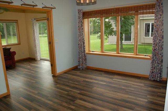 224 Goldfinch Ln, Clearwater, MN 55320 - unfurnished room with healthy amount of natural light and dark wood finished floors
