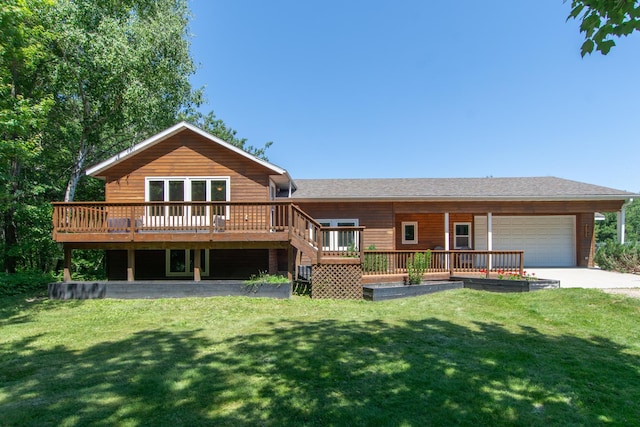 8290 Gladstone Lake Rd, Brainerd, MN 56401 - back of house featuring a garage, a deck, a yard, concrete driveway, and a shingled roof