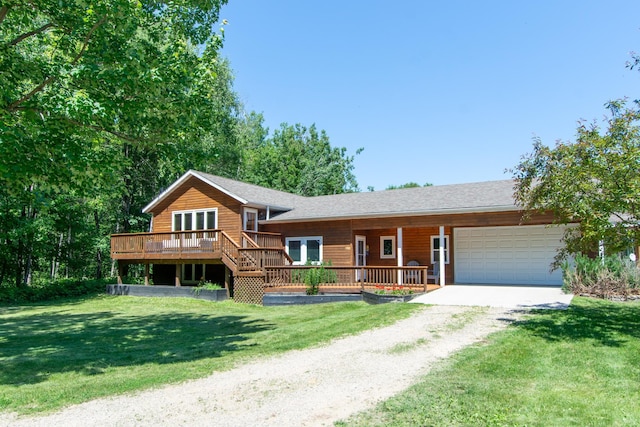 8290 Gladstone Lake Rd, Brainerd, MN 56401 - view of front of property with dirt driveway, a garage, a front lawn, and a deck