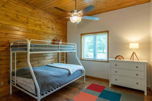 8290 Gladstone Lake Rd, Brainerd, MN 56401 - bedroom featuring wooden ceiling, wood finished floors, wood walls, and ceiling fan