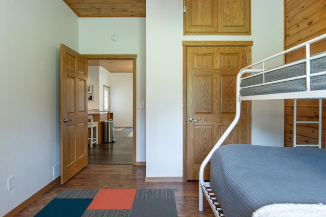 8290 Gladstone Lake Rd, Brainerd, MN 56401 - bedroom featuring dark wood-style flooring and baseboards