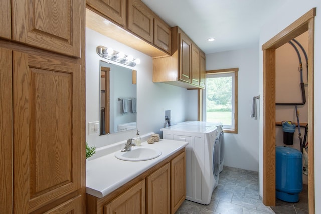 8290 Gladstone Lake Rd, Brainerd, MN 56401 - bathroom with washer and dryer, vanity, and recessed lighting