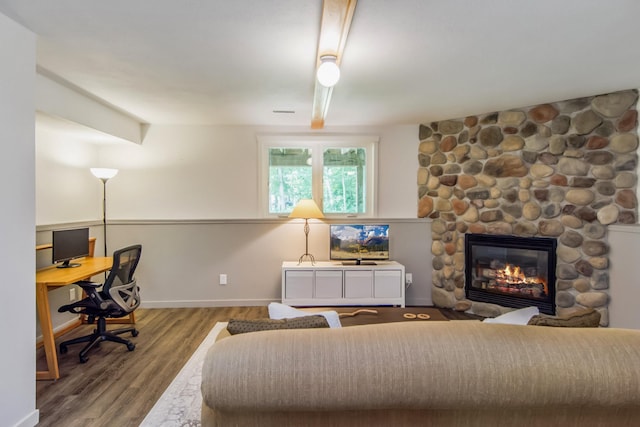 8290 Gladstone Lake Rd, Brainerd, MN 56401 - office space featuring a fireplace and wood finished floors