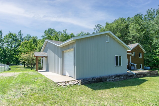 8290 Gladstone Lake Rd, Brainerd, MN 56401 - view of property exterior featuring a yard and a garage