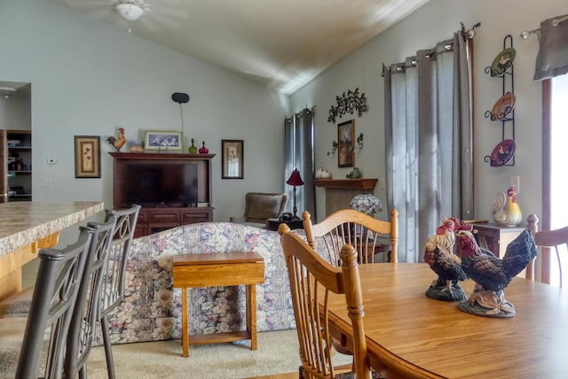 5010 384th Trl, North Branch, MN 55056 - carpeted dining area featuring lofted ceiling and ceiling fan
