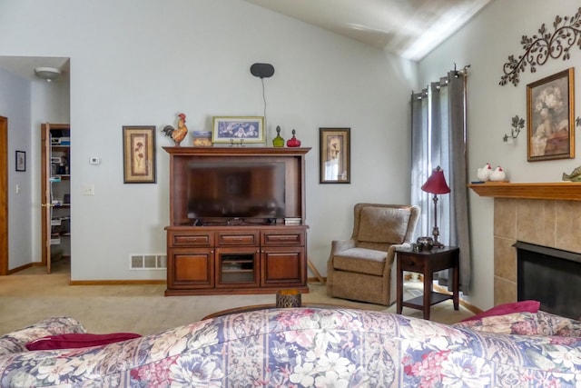5010 384th Trl, North Branch, MN 55056 - living room with carpet, vaulted ceiling, and a fireplace