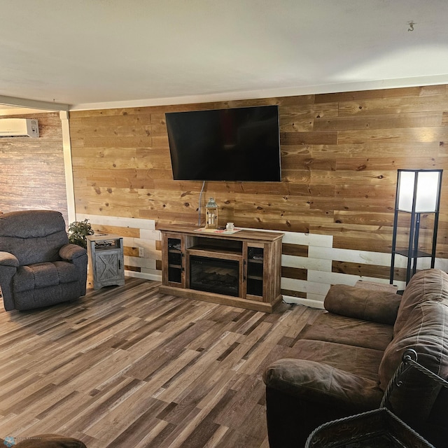 327 6th Ave, Mapleton, ND 58059 - living area with wooden walls, a wall mounted AC, and wood finished floors