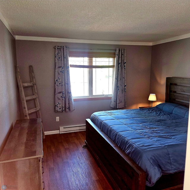327 6th Ave, Mapleton, ND 58059 - bedroom with a baseboard heating unit, a textured ceiling, dark wood finished floors, and crown molding