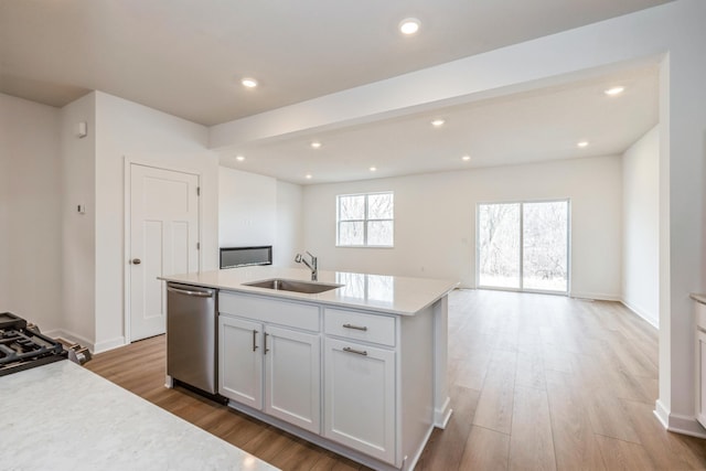 10280 187th Ave NW, Elk River, MN 55330 - kitchen featuring dishwasher, open floor plan, light countertops, light wood-type flooring, and recessed lighting