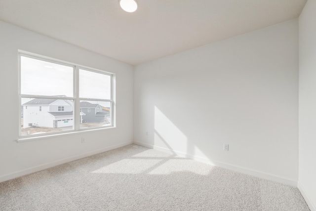 10280 187th Ave NW, Elk River, MN 55330 - carpeted empty room with baseboards