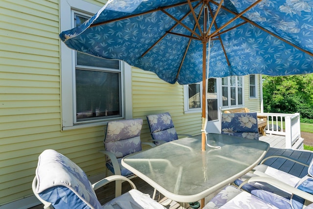 11826 State Road 48, Frederic, WI 54837 - wooden terrace with outdoor dining area