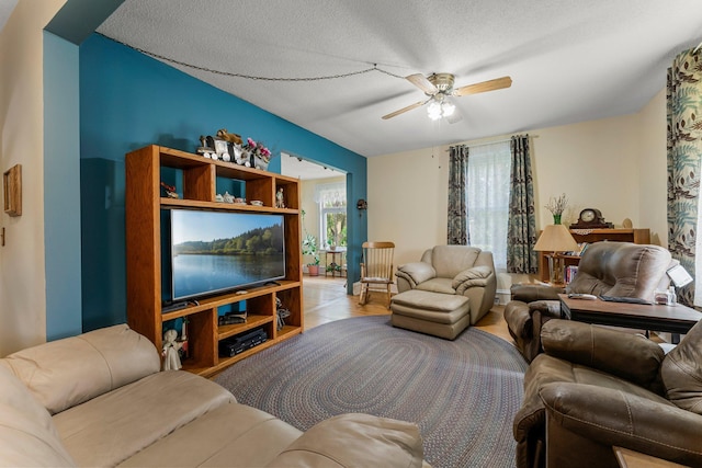 11826 State Road 48, Frederic, WI 54837 - living area featuring a ceiling fan, wood finished floors, and a textured ceiling