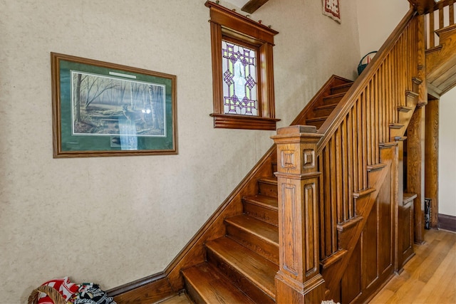 11826 State Road 48, Frederic, WI 54837 - staircase featuring wood finished floors