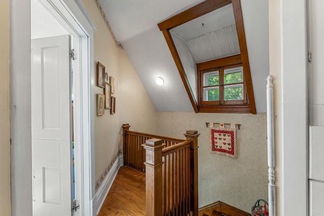 11826 State Road 48, Frederic, WI 54837 - corridor with an upstairs landing, wood finished floors, and lofted ceiling