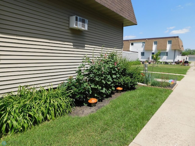 961 4th Ave W Unit B, West Fargo, ND 58078 - view of side of home with a lawn