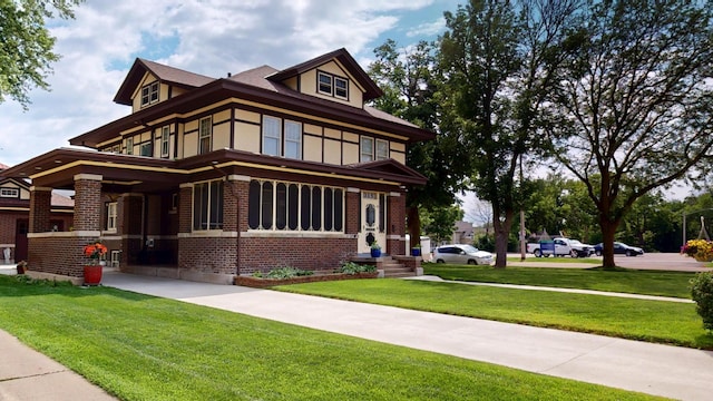 315 Fountain St, Albert Lea, MN 56007 - view of front of property featuring brick siding and a front yard