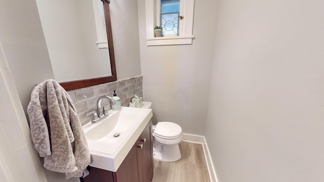315 Fountain St, Albert Lea, MN 56007 - bathroom featuring wood finished floors, vanity, and tile walls