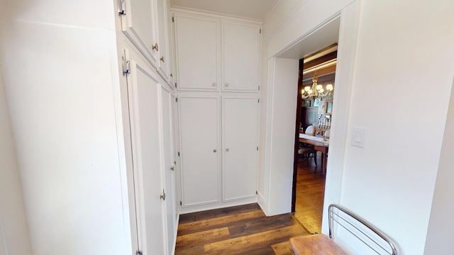315 Fountain St, Albert Lea, MN 56007 - corridor featuring a chandelier, dark wood-style floors, and baseboard heating