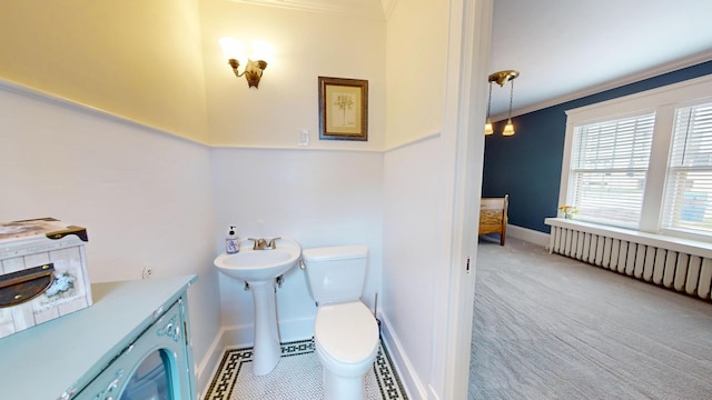 315 Fountain St, Albert Lea, MN 56007 - bathroom featuring toilet and crown molding