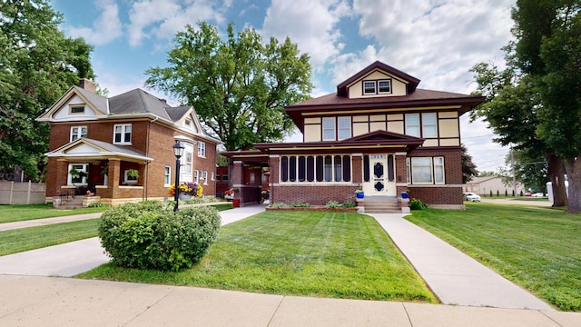 315 Fountain St, Albert Lea, MN 56007 - view of front of property featuring brick siding and a front lawn