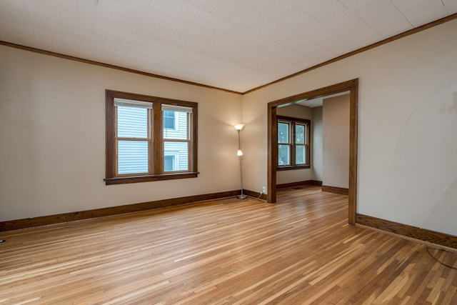 616 5th St, Mankato, MN 56001 - empty room featuring crown molding and light wood-type flooring