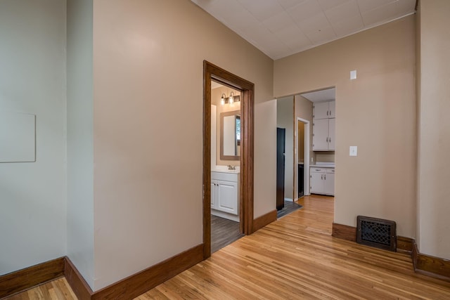 616 5th St, Mankato, MN 56001 - corridor featuring light wood-style flooring