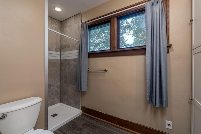 616 5th St, Mankato, MN 56001 - full bathroom with tiled shower and wood finished floors