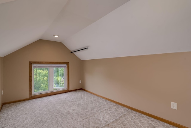 616 5th St, Mankato, MN 56001 - additional living space featuring vaulted ceiling and carpet floors
