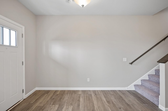 15484 Eames Way, Apple Valley, MN 55124 - entryway featuring wood finished floors and stairs