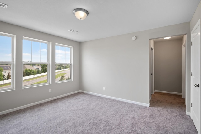 15484 Eames Way, Apple Valley, MN 55124 - spare room featuring carpet floors and a smoke detector