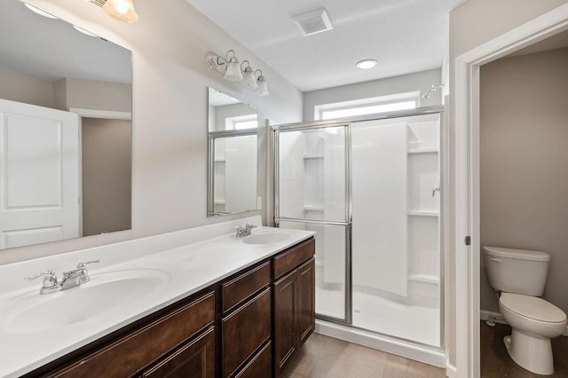 15484 Eames Way, Apple Valley, MN 55124 - bathroom featuring a stall shower and double vanity