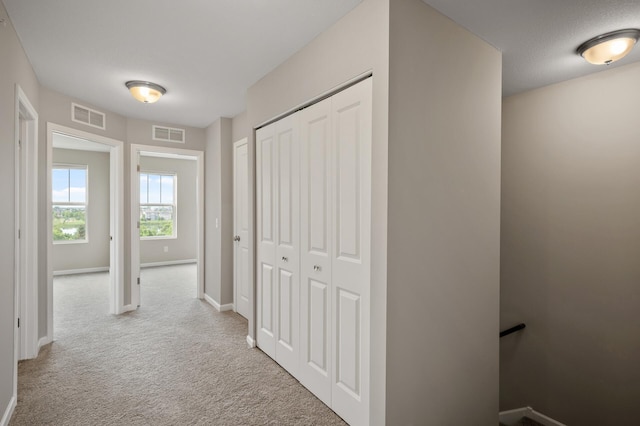 15484 Eames Way, Apple Valley, MN 55124 - hall with an upstairs landing and light colored carpet