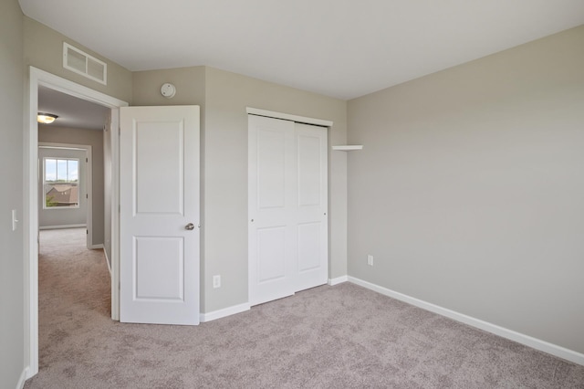 15484 Eames Way, Apple Valley, MN 55124 - unfurnished bedroom with carpet floors and a closet