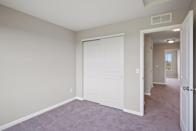 15484 Eames Way, Apple Valley, MN 55124 - unfurnished bedroom with carpet flooring and a closet