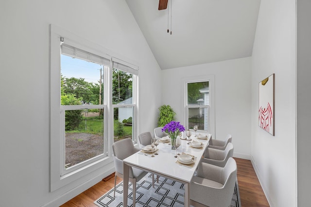 1175 Seminary Ave, Saint Paul, MN 55104 - dining room featuring vaulted ceiling, wood finished floors, and a ceiling fan