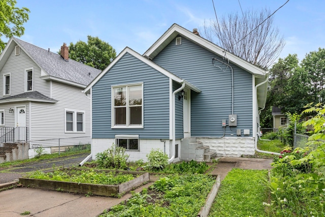 1175 Seminary Ave, Saint Paul, MN 55104 - rear view of house with a chimney