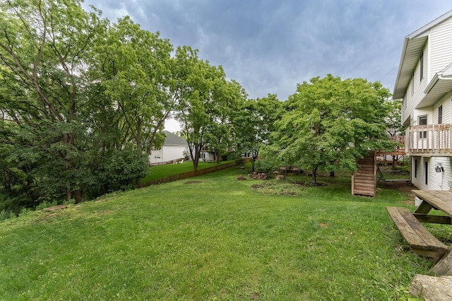 2319 Viola View Ln NE, Rochester, MN 55906 - view of grassy yard featuring a wooden deck and stairway