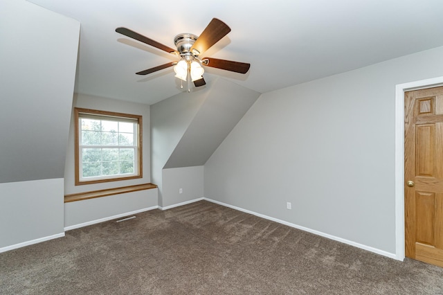 2319 Viola View Ln NE, Rochester, MN 55906 - additional living space with dark colored carpet, ceiling fan, and lofted ceiling