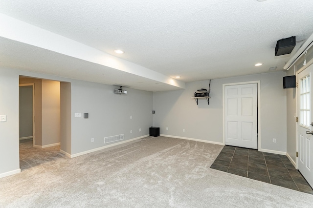 2319 Viola View Ln NE, Rochester, MN 55906 - below grade area featuring carpet flooring, recessed lighting, and a textured ceiling