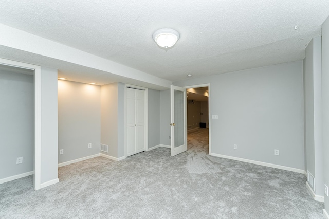 2319 Viola View Ln NE, Rochester, MN 55906 - unfurnished bedroom with carpet floors and a textured ceiling