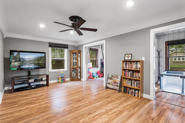 3256 Sheridan Ave N, Minneapolis, MN 55412 - sitting room featuring light wood finished floors, ceiling fan, crown molding, and recessed lighting
