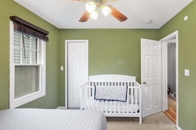 3256 Sheridan Ave N, Minneapolis, MN 55412 - carpeted bedroom with a ceiling fan and baseboards