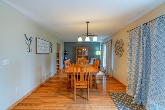 704 Main St, Madelia, MN 56062 - dining space with light wood-style flooring