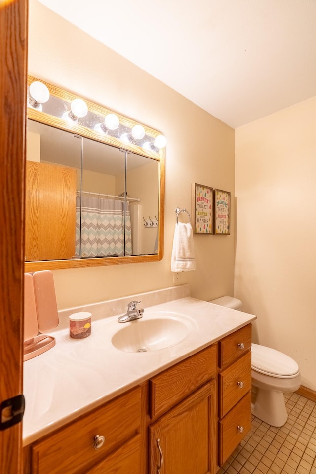 704 Main St, Madelia, MN 56062 - full bath with vanity, tile patterned floors, and a shower with shower curtain
