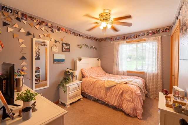 704 Main St, Madelia, MN 56062 - bedroom with light carpet and a ceiling fan