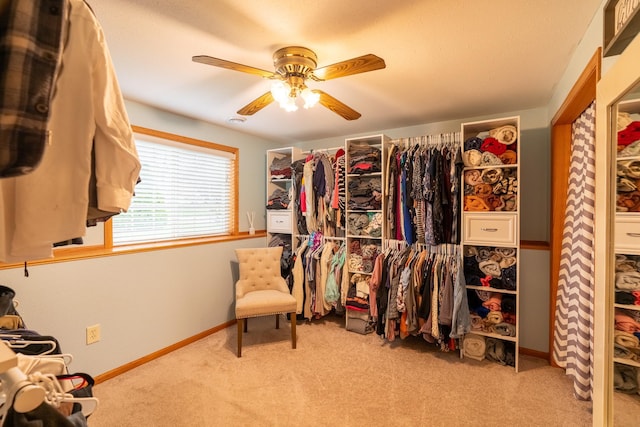 704 Main St, Madelia, MN 56062 - spacious closet featuring carpet flooring and a ceiling fan