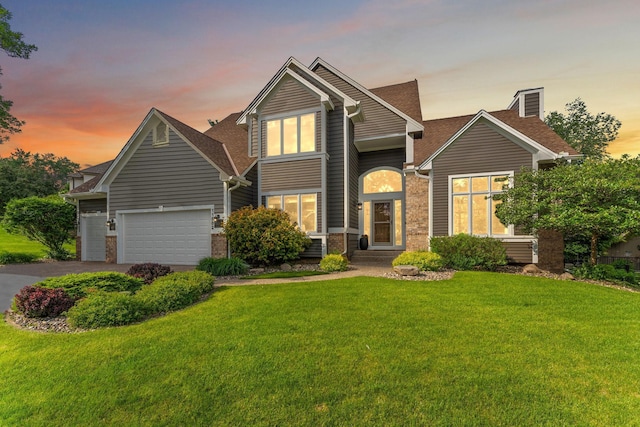 11582 Raspberry Hill Rd, Eden Prairie, MN 55344 - traditional-style house with asphalt driveway, a lawn, a shingled roof, a garage, and a chimney